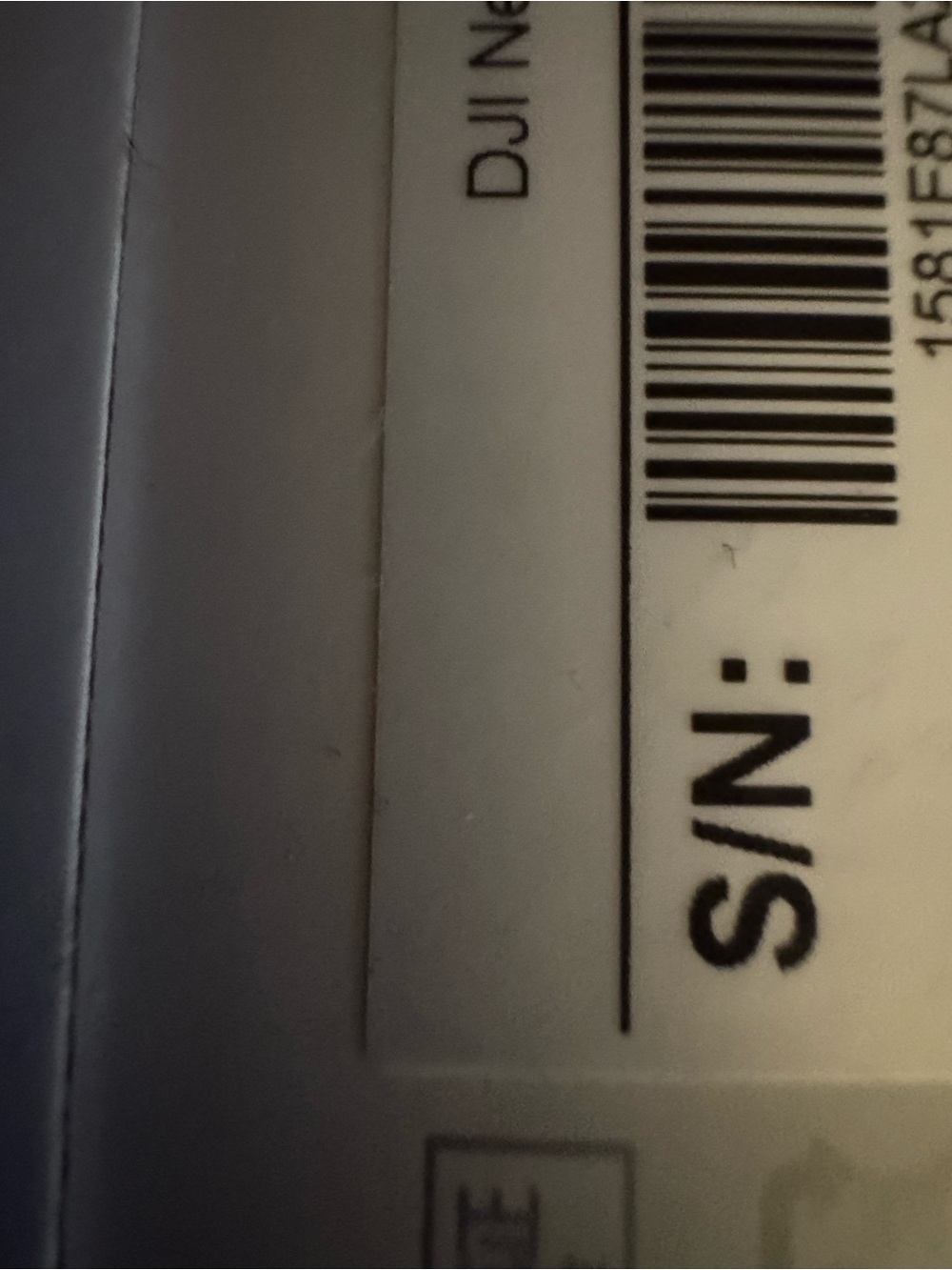 DJI Mini Drone Packaging - White and Red Accents comes with land options as well - Picture 5 of 5